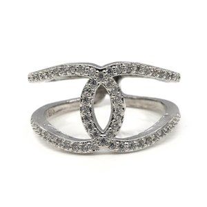 Silver ring with rhinestone.